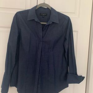 Blue button up blouse.